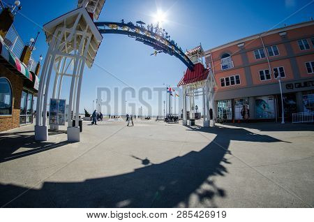 Ocean City, Maryland - April 3, 2018: Arch And Welcome Sign To The Ocean City Boardwalk On A Sunny D