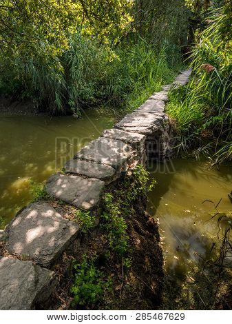 The Small Roman Footbridge Pont De Gras Near Saint-lyphard (france) On A Sunny Day In Summer