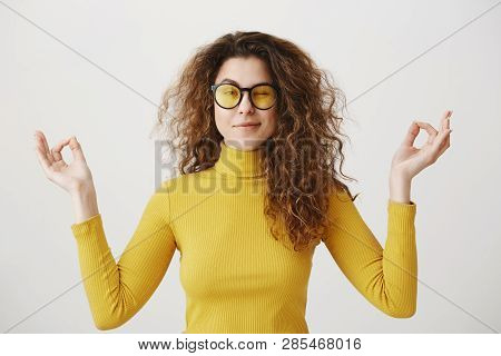 Portrait Calm Woman Smiling Doing Yoga Exercises Relaxing On White Blank Studio Wall, Happy Young Gi