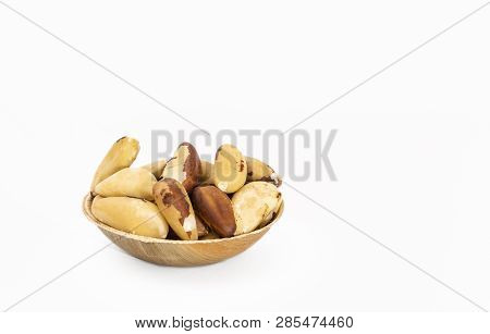 Bowl Of Brazil Nuts (bertholletia Excelsa) On A White Background