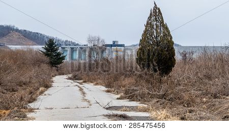Road To Dam In Field