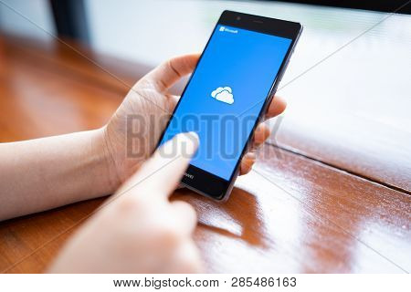Chiang Mai, Thailand - Feb. 18,2019: Woman Holding Huawei With Onedrive On Screen. Microsoft Onedriv