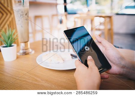 Chiang Mai, Thailand - Jan. 19,2019: Woman Holding Huawei With Uber Apps. Uber Is Smartphone App Tra