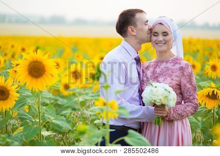 Islamic Wedding Ceremony In Field. Wedding Couple. Muslim Marriage
