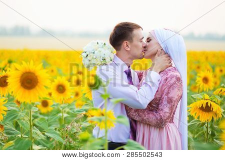 Islamic Wedding Ceremony In Field. Wedding Couple. Muslim Marriage