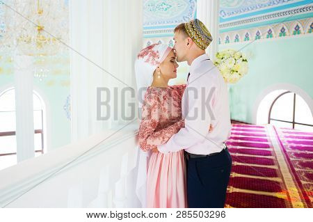 Muslim Wedding Of A Couple In Mosque. Nikah