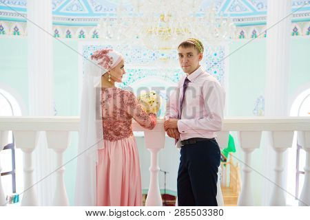 Muslim Wedding Of A Couple In Mosque. Nikah