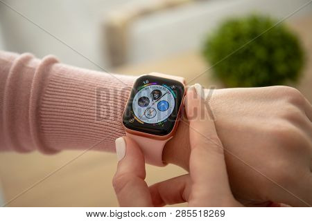 Anapa, Russia - February 16, 2019: Woman Hand With Apple Watch Series 4 And Finger Touching Screen. 