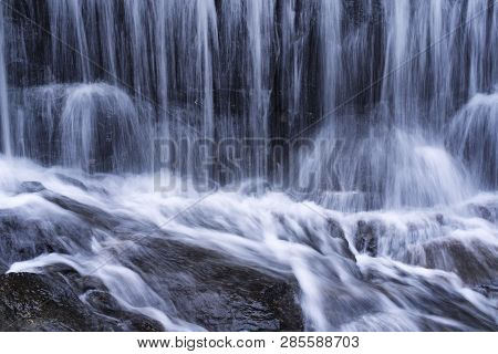 A Blurred Waterfall Background Nature Picture At Burr Pond Torrington, Connecticut.