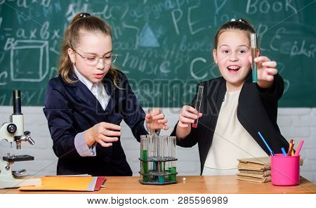 Be Careful Performing Chemical Reaction. Basic Knowledge Of Chemistry. Girls Study Chemistry. Make S