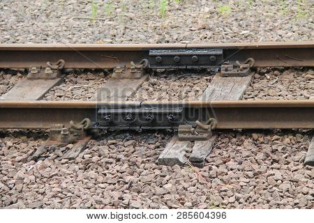 Newly Replaced Track Fishplates On Old Train Track.