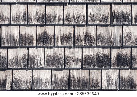 Wooden Tiles Texture. Wall Of An Old Rural House.
