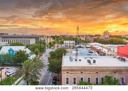 Gainesville, Florida, USA downtown cityscape at dusk.