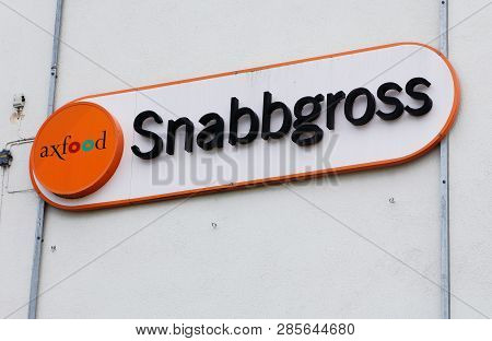 Solna, Sweden - June 22, 2016: Sign Outside The Axfood Group Snabbgross Supermarket In The Solna Bus