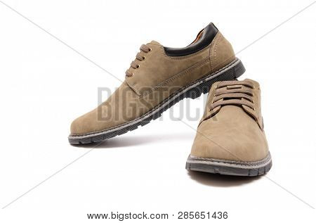 Brown suade shoes isolated on white background