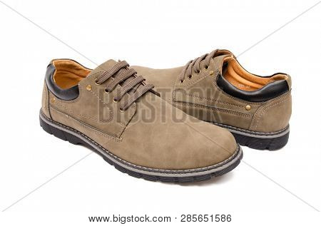 Brown suade shoes isolated on white background