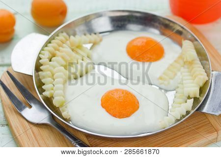 Healthy Breakfast Idea For Kids - Fried Eggs With French Fries Made From Cream, Apricot And Fresh Ap