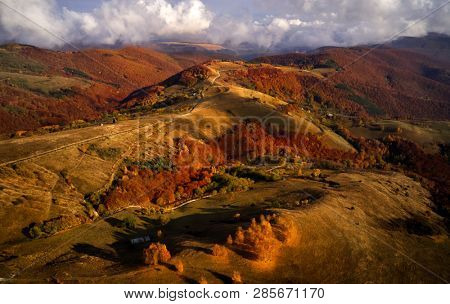 aerial view of Carpathian mountains countryside in autumn morning, Romania