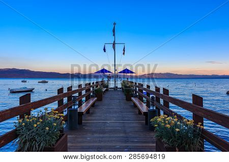 Carnelian Bay, Califronia Usa - July 18, 2015: Scenic View Onto Lake Tahoe At Sunset From An Old Woo