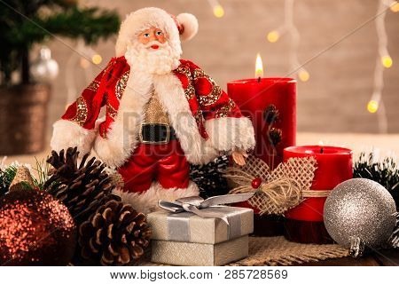 The Christmas Decoration With Balls And Candle