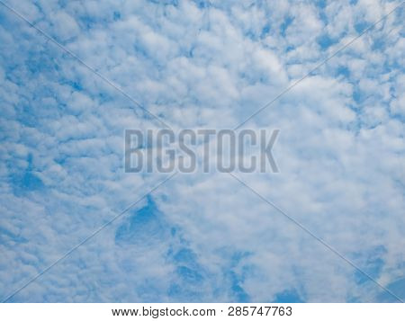 Cloudscape With White Altocumulus Clouds At Evening