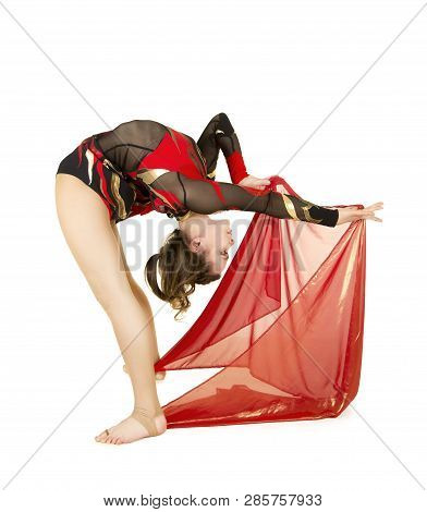 Flexible Equilibrist Performs Exercises On Acrobatic Walking Sticks.