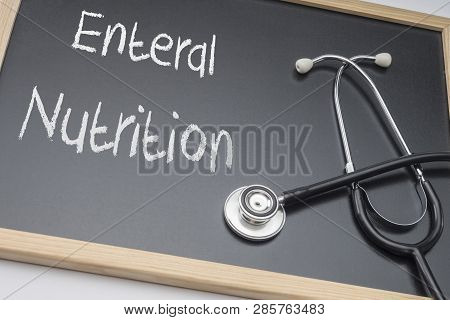 Enteral Nutrition Written On A Blackboard, Conceptual Image, Horizontal Composition