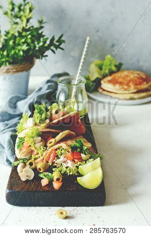 Unsweetened Pancakes With Turkey, Lettuce, Tomatoes, Pickled Mushrooms, Olives And Greens In The For