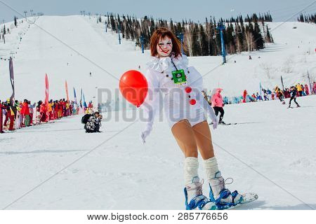 Sheregesh, Kemerovo Region, Russia - April 7, 2018: Young Woman Dressed Like Pennywise From Movie It