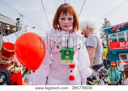 Sheregesh, Kemerovo Region, Russia - April 7, 2018: Young Woman Dressed Like Pennywise From Movie It