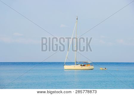 White Sailboat Of Tourist At The Background The Blue Sky On The Ao Thai Sea Area Around Haad Bangbao