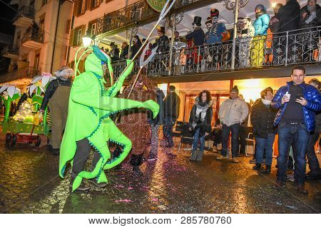Participants In Costumes Perform A Street Procession At The Carnival