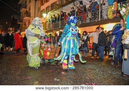 Participants In Costumes Perform A Street Procession At The Carnival