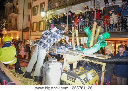 Participants In Costumes Perform A Street Procession At The Carnival