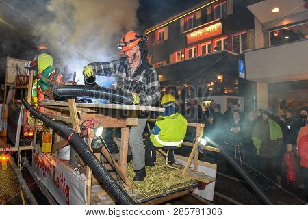 Participants In Costumes Perform A Street Procession At The Carnival