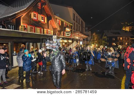 Participants In Costumes Perform A Street Procession At The Carnival