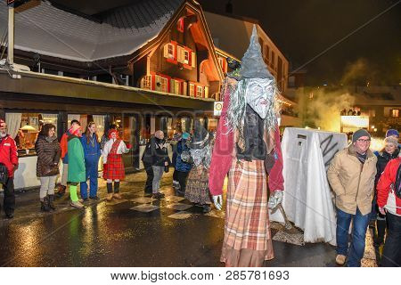 Participants In Costumes Perform A Street Procession At The Carnival