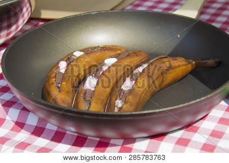 Fried Bananas In A Skillet. Unusual Fruit Dishes