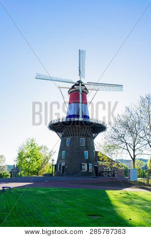 Windmill Of Leiden Wrapped In Netherlands Three Colored Flag, Holland, Netherlands
