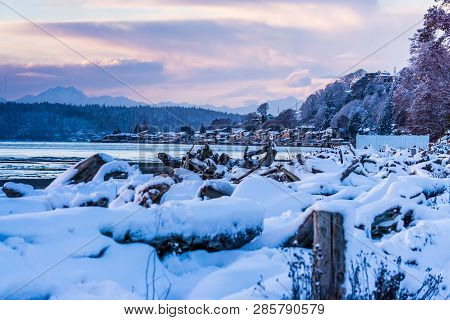 A View Of Three Tree Point In Burien, Washington. It Is Evening On A Winter Day.