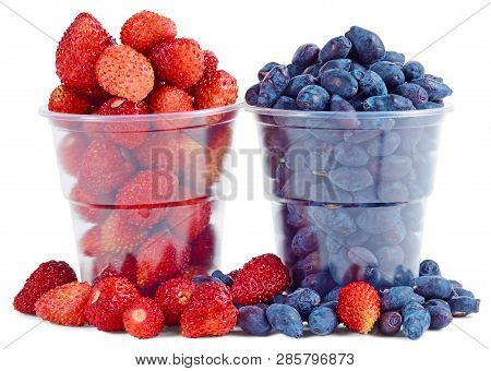 Strawberries And Honeysuckle In Plastic Cups Isulated