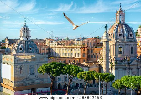 Trajans Column And Churches In Rome At Sunset