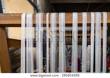 Kastamonu,turkey-november 05,2017: Woman Working At The Loom. Turkey National Crafts. Focused On The