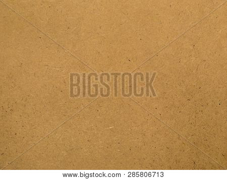 The Texture Of The Surface Of The Fiberboard Is Brown.