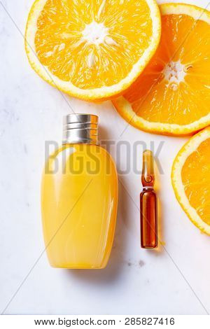 Vitamin C, Natural Anti Aging Cosmetics Cream Bottle And Serum Ampula