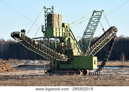 Stone Crusher In The Quarry. Working Mining Machine - Stone Crusher. Quarrying Of Stones For Constru