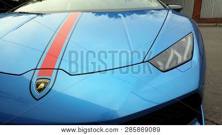 Moscow. Autumn 2018. Bright Blue Lamborghini Huracan Parked On The Street. With Red Stripe On A Car 