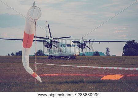 Parachutist Aircraft On Land