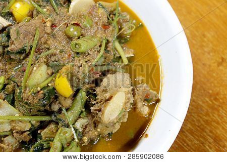 Northern Thai Spicy Curry With Pork And Mixed Vegetables And Thai Herbs With A Northern Spices In Wh