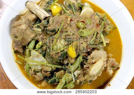 Northern Thai Spicy Curry With Pork And Mixed Vegetables And Thai Herbs With A Northern Spices In Wh